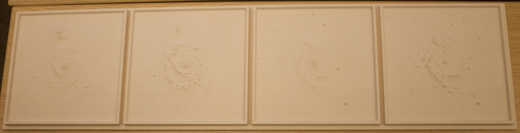 four galaxy models milled out of high density foam